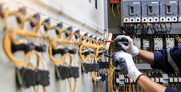 Professional Electrician technician working in Mitchellville, IA